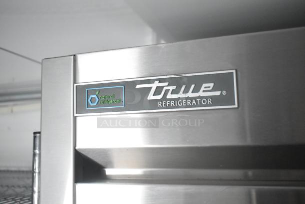 True Refrigerator label indicating use of natural refrigerant, featured in a Southern Dimensions 24' trailer.