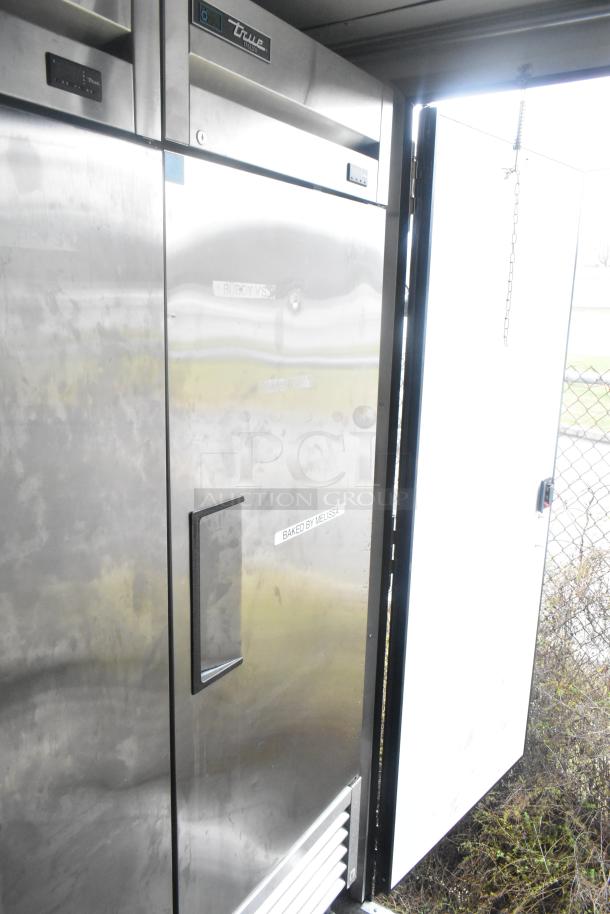 Southern Dimensions 24' trailer with commercial True coolers. Features include sinks, shelving, and clear title. Labels visible.