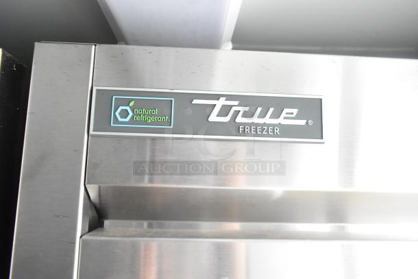 True freezer with natural refrigerant label, part of a Southern Dimensions 24' cold food and beverage trailer.