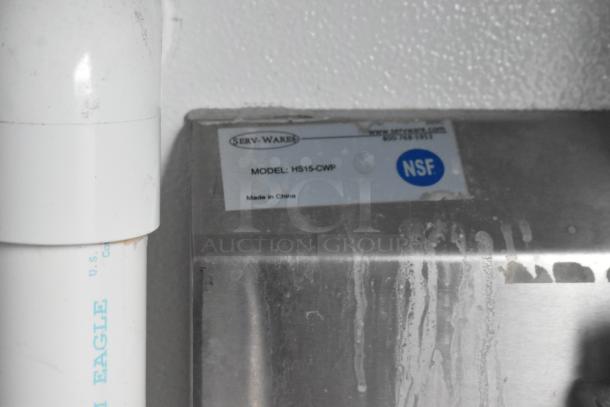 "NSF label and Serv-Ware model HS15-CWP sticker on a stainless steel component of a Southern Dimensions 24' trailer."