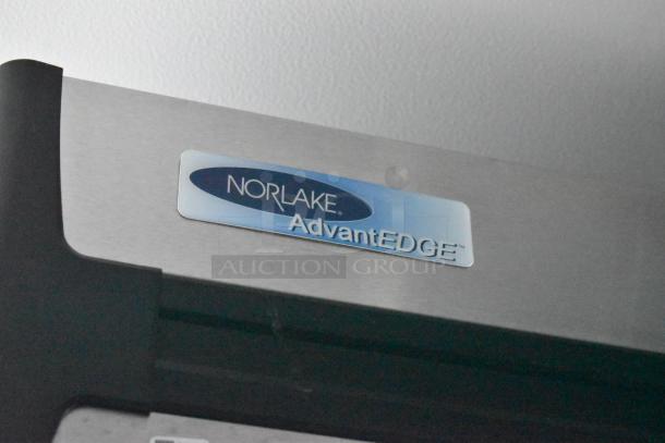 Norlake AdvantEDGE cooler label on stainless surface, highlighting commercial-grade equipment in Southern Dimensions trailer.