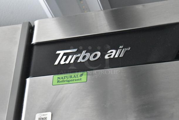 Turbo Air refrigerator showing "Natural Refrigerant" label, part of the 2021 Southern Dimensions 24' outfitted trailer.