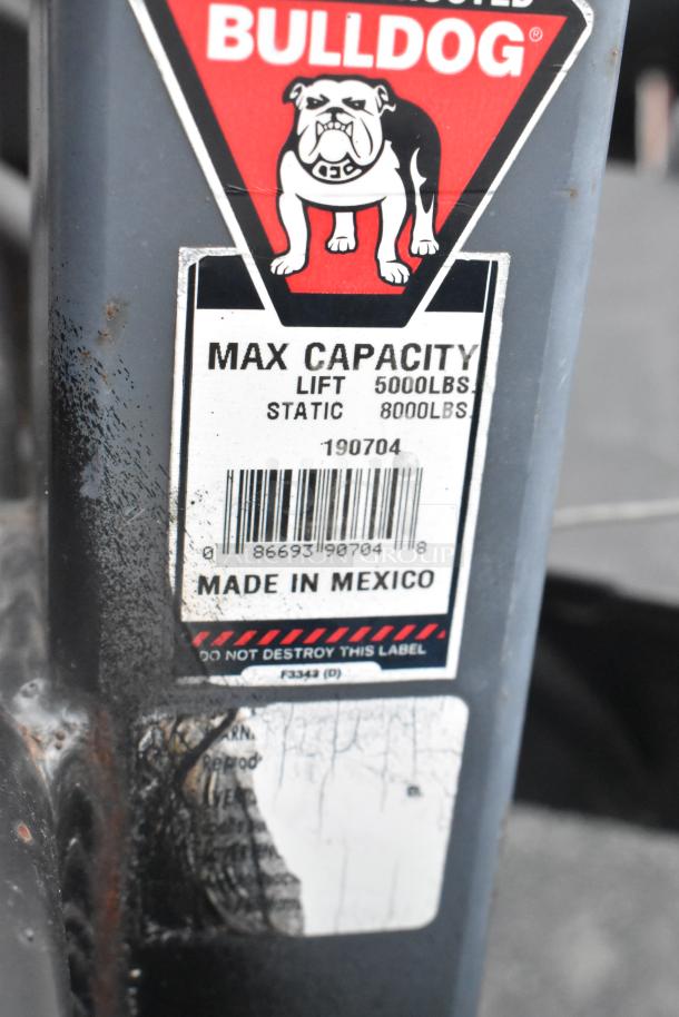 Label on Southern Dimensions trailer, marked "Bulldog," showing max lift capacity 5000lbs, static 8000lbs, Made in Mexico.