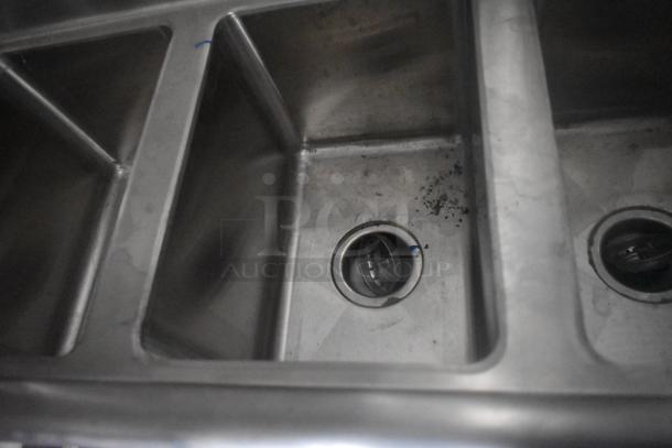 Stainless steel triple-compartment sink in new ATX 24' food trailer. Ideal for commercial kitchen use.