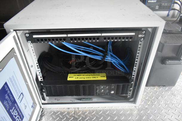 Open control panel with visible wiring and switchboard inside the ATX 24' unbranded food trailer.