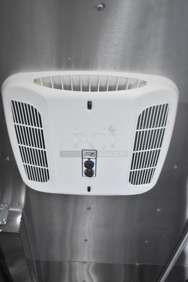 Interior view of ATX 24' food trailer showing a ceiling-mounted white air vent on a stainless steel surface.