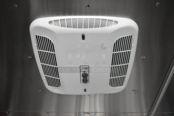Ceiling-mounted air vent in ATX 24' food trailer, with adjustable airflow settings, sleek design for optimal ventilation.
