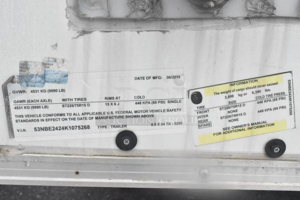Label on a Cruising Kitchens food trailer, MFG date 06/2019, GVWR 4531 kg, trailer type, tire specs, V.I.N. 53NBE2424K1075268.