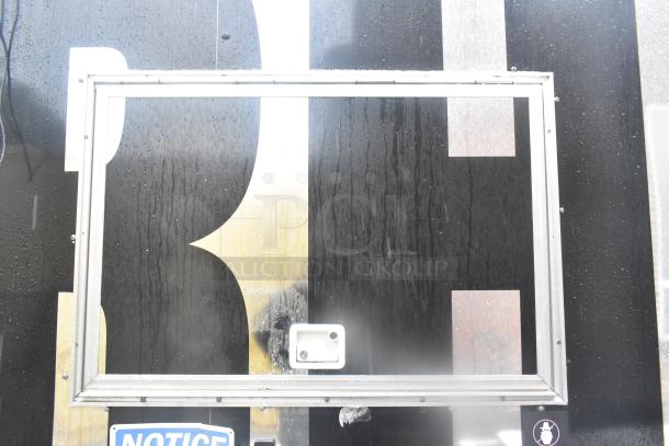 Cruising Kitchens 24' food trailer exterior with serving window and signage.