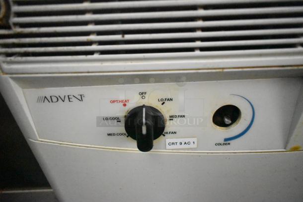 Advent HVAC control panel with options for heating and cooling, featuring switches for fan speed and temperature adjustment.