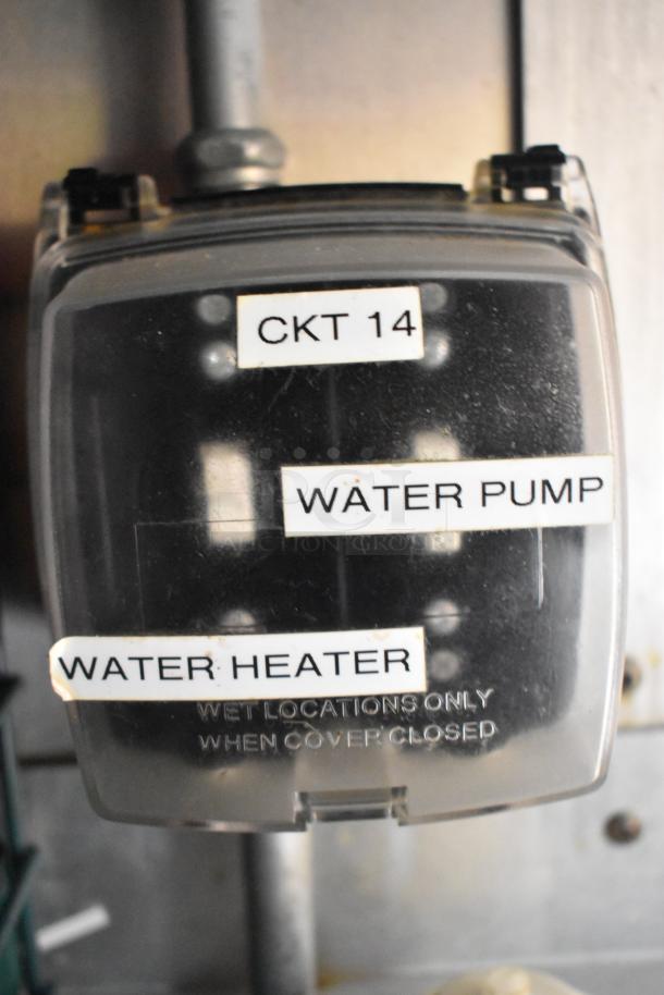Cruising Kitchens food trailer circuit box labeled "CKT 14," "Water Pump," and "Water Heater."