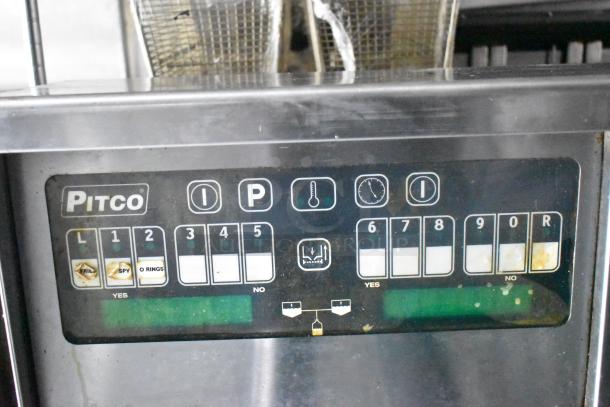 Close-up of a Pitco control panel on a Cruising Kitchens food trailer; features various settings for fryer operations.