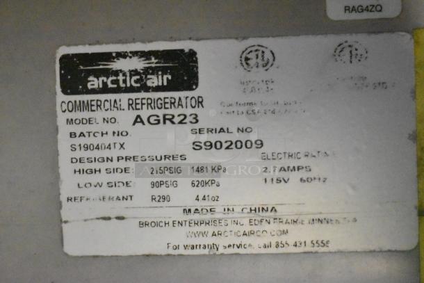 Label on Arctic Air commercial refrigerator, model AGR23, serial S902009, batch S190404TX, with design pressures and electrical specs.