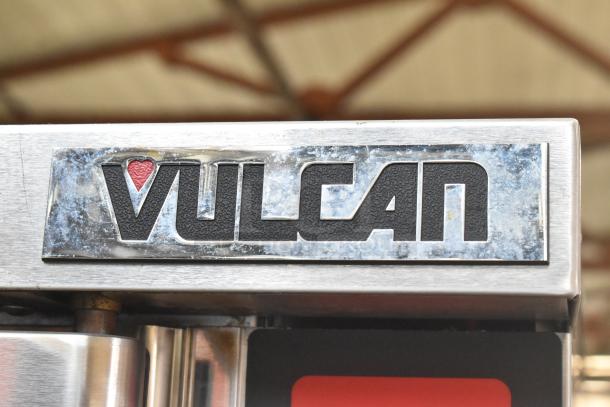 Vulcan VC6GD-SEFCAM stainless steel commercial gas convection oven with brand logo detail.