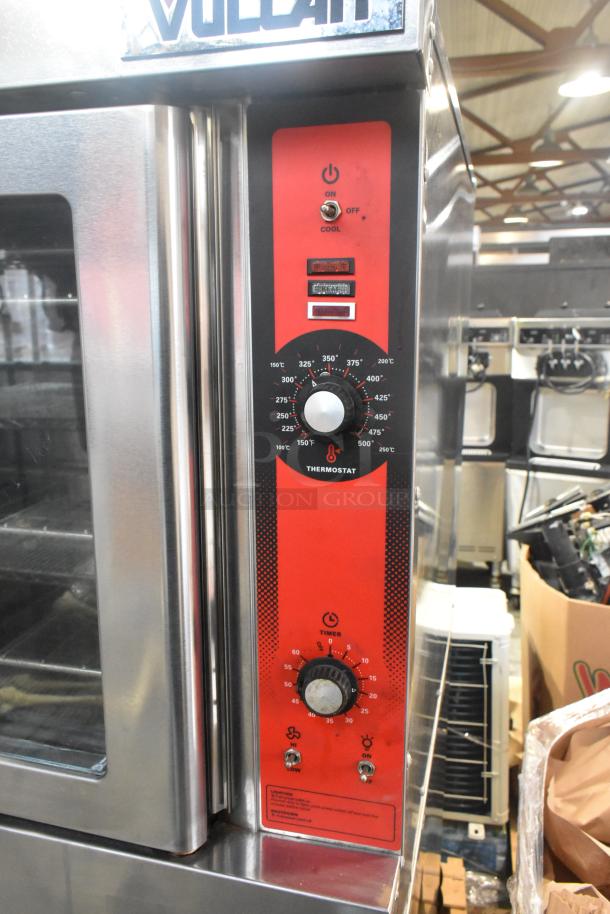 Vulcan VC6GD-SEFCAM stainless steel commercial gas convection oven with view-through doors, metal racks, and thermostatic controls.