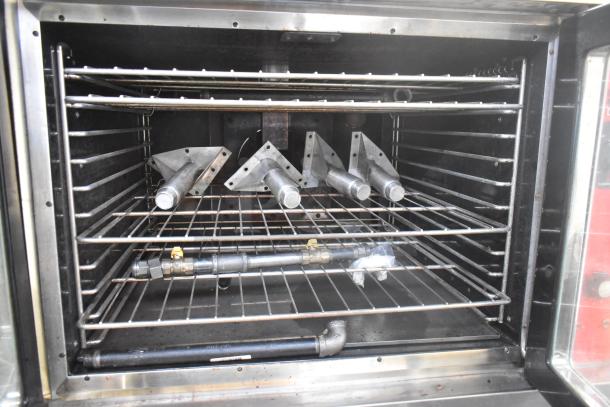 Vulcan VC6GD-SEFCAM commercial gas convection oven, stainless steel, metal racks, thermostatic controls, view-through doors.