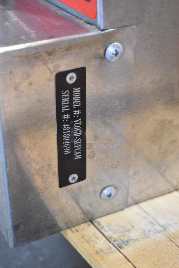 Vulcan VC6GD-SEFCAM stainless steel convection oven label showing model and serial number.