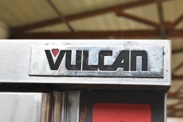 Close-up of Vulcan logo on stainless steel commercial convection oven model VC6GD-SEFCAM5.