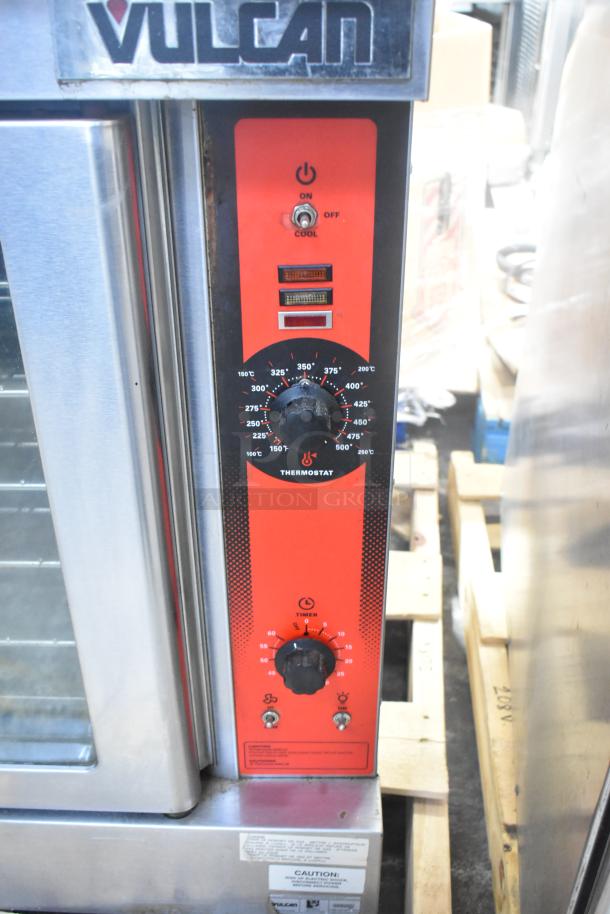 Vulcan VC6GD-SEFCAM5 gas convection oven with stainless steel finish, view-through doors, racks, thermostatic controls.