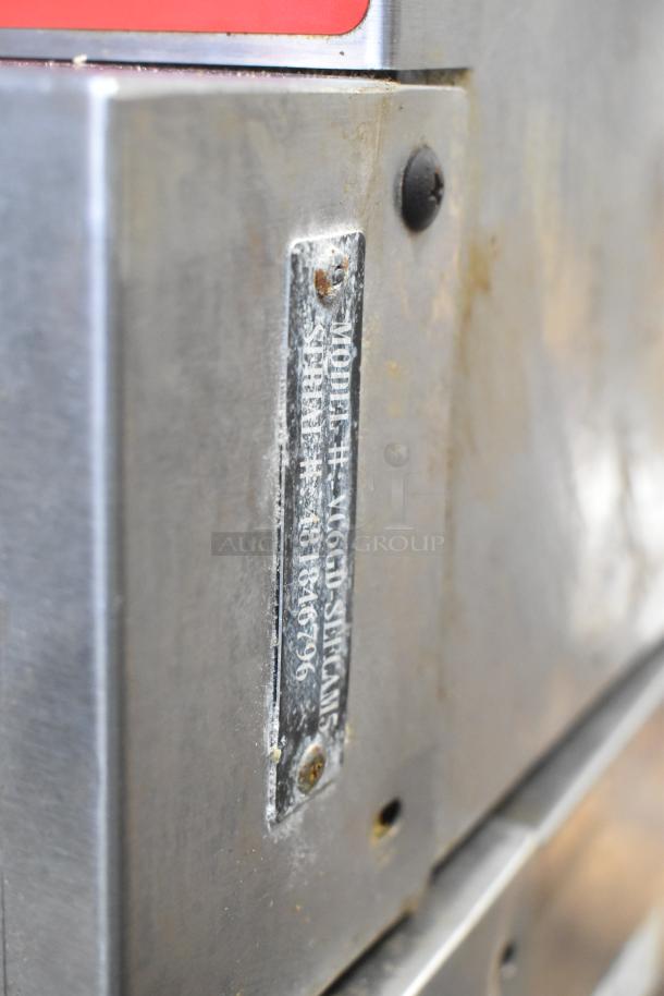 Vulcan VC6GD-SEFCAM5 stainless steel convection oven, model plaque with serial number, showing light wear.