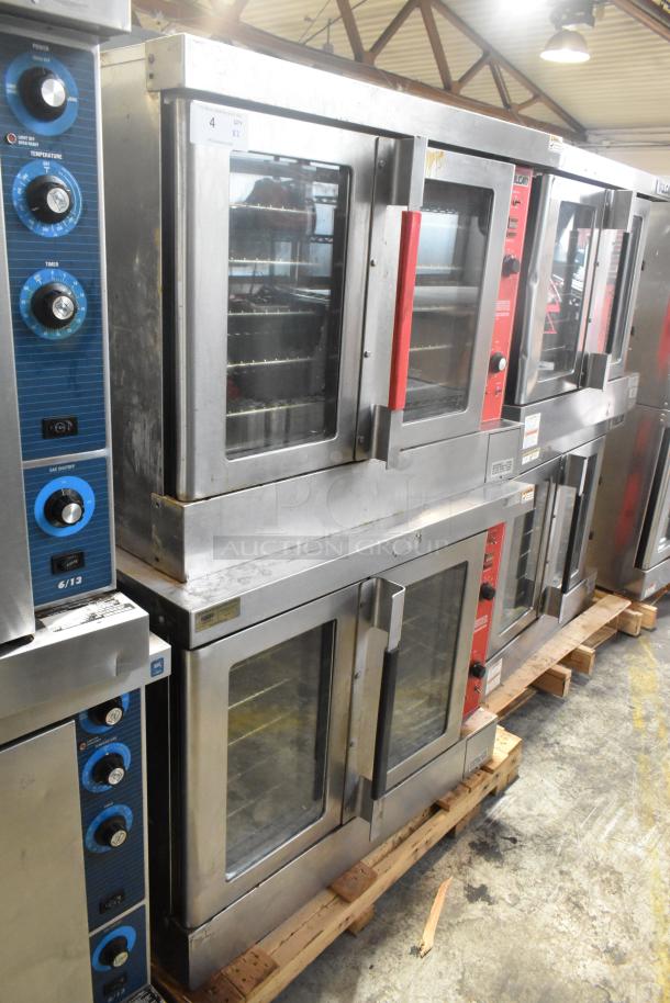 Vulcan VC6GD-SEFCAM stainless steel commercial convection ovens, gas powered, view-through doors, metal racks, thermostatic controls.