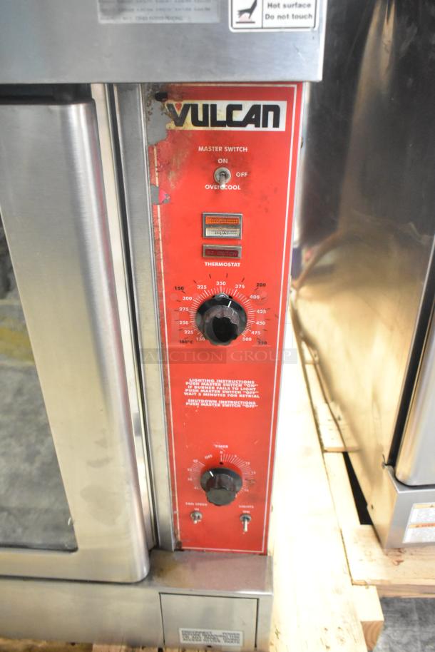 Vulcan VC6GD-SEFCAM stainless steel commercial gas convection oven with view-through doors, metal racks, and thermostatic controls.