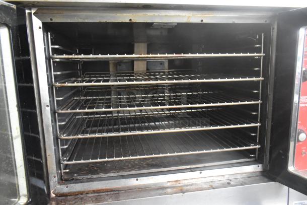 Vulcan VC6GD-SEFCAM commercial gas convection oven, full size, stainless steel, view-through doors, metal racks, thermostatic controls.