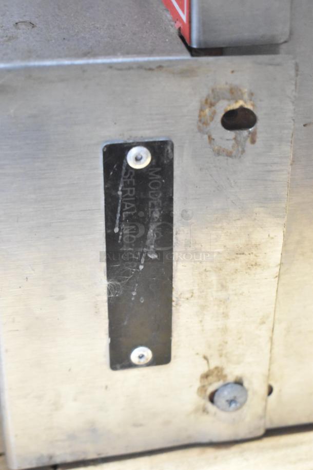 Vulcan VC6GD-SEFCAM stainless steel convection oven, visible serial number plate, metal wear, commercial use.