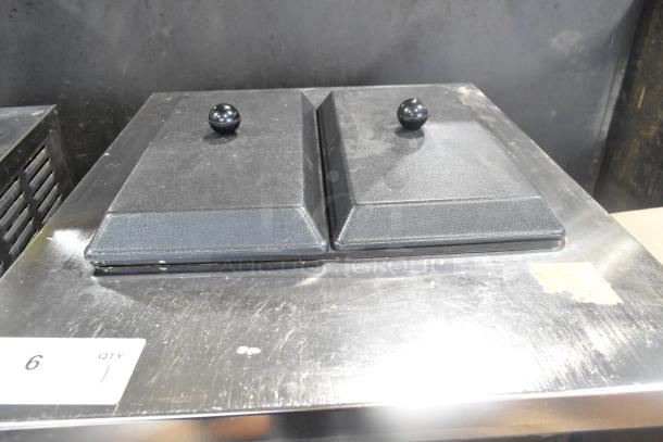 Wellspring SSI-143S stainless steel ice cream machine, dual flavor with twist, on casters, 220V, 1 phase. Slight wear visible.