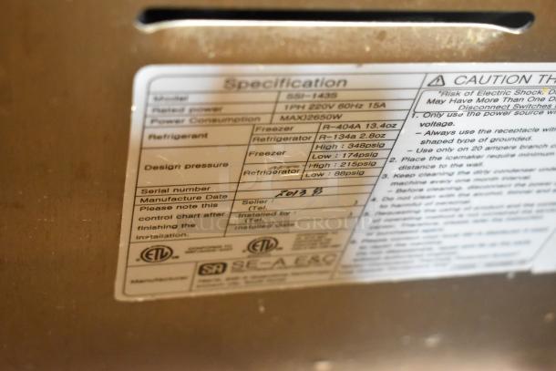 Wellspring SSI-143S stainless steel soft serve machine, 2-flavor with twist, 220V, 1 phase, on commercial casters. Serial: 2013.