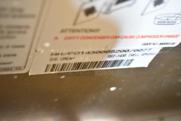 Label on Wellspring SSI-143S ice cream machine, showing model details and barcode for identification.