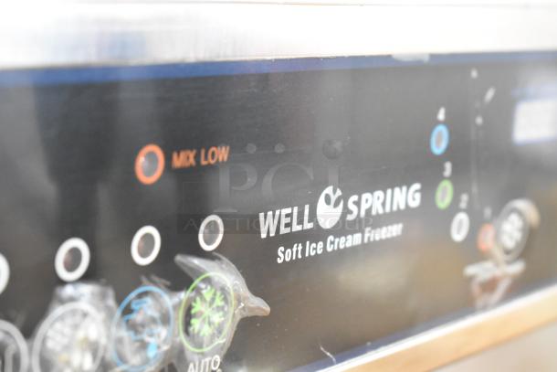 Wellspring SSI-143S soft serve ice cream machine panel with mix low indicator; stainless steel, commercial use.