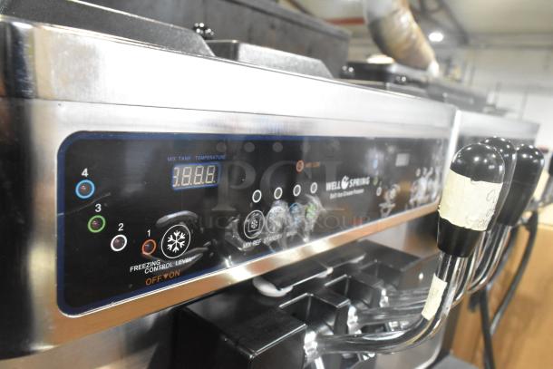 Wellspring SSI-143S stainless steel soft serve ice cream machine, control panel view, 220V, 1 phase, on commercial casters.