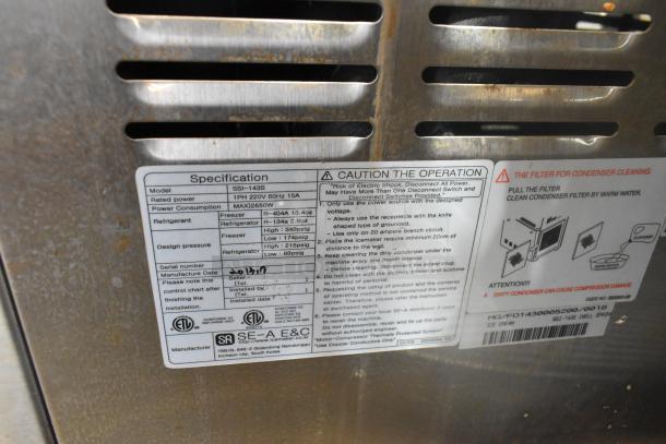 Wellspring SSI-143S stainless steel 2-flavor soft serve machine with twist. Features 220V, 1 phase, commercial casters.