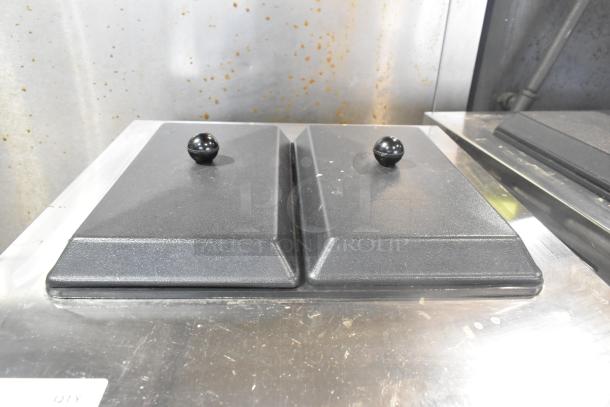 Wellspring SSI-143S soft serve ice cream machine top view, stainless steel, two flavor with twist, commercial casters, 220V.