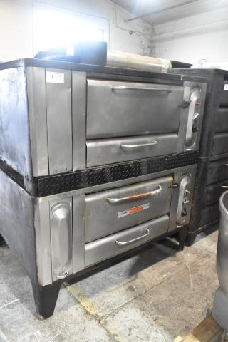 Blodgett stainless steel gas-powered single deck pizza ovens, used condition, with cooking stones and visible brand logo.