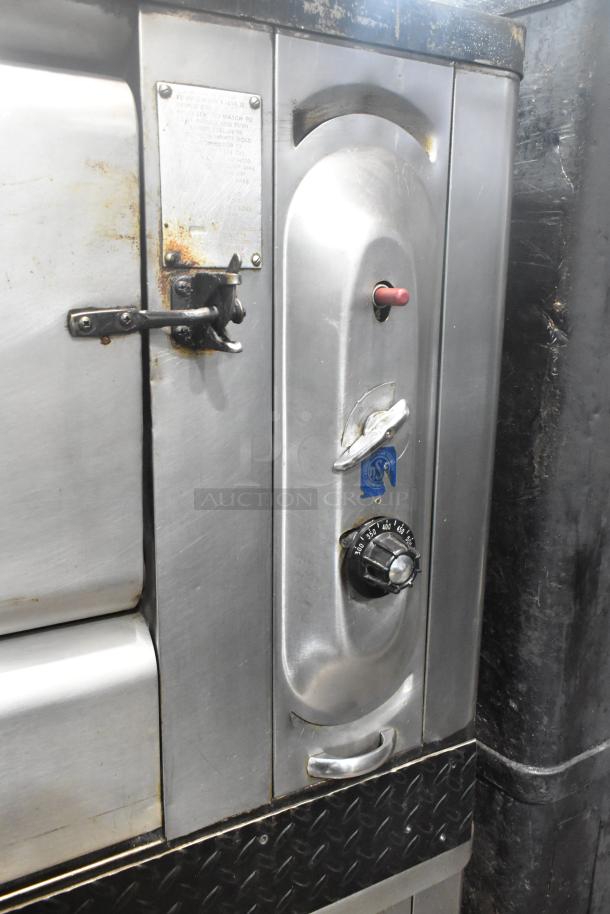 Blodgett stainless steel commercial gas pizza ovens, single deck, visible temperature dial, used condition.