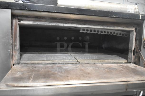 Blodgett stainless steel commercial gas pizza oven with cooking stones, single deck, shows used condition.