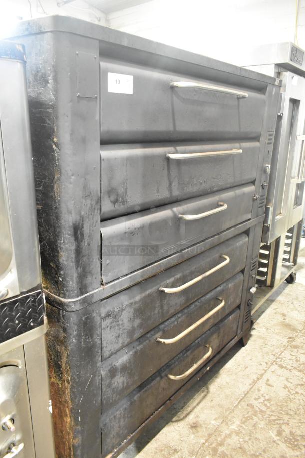 Blodgett 981 stainless steel commercial pizza oven, natural gas, 2-deck, 50,000 BTU. Visible wear on surface, label number 10.