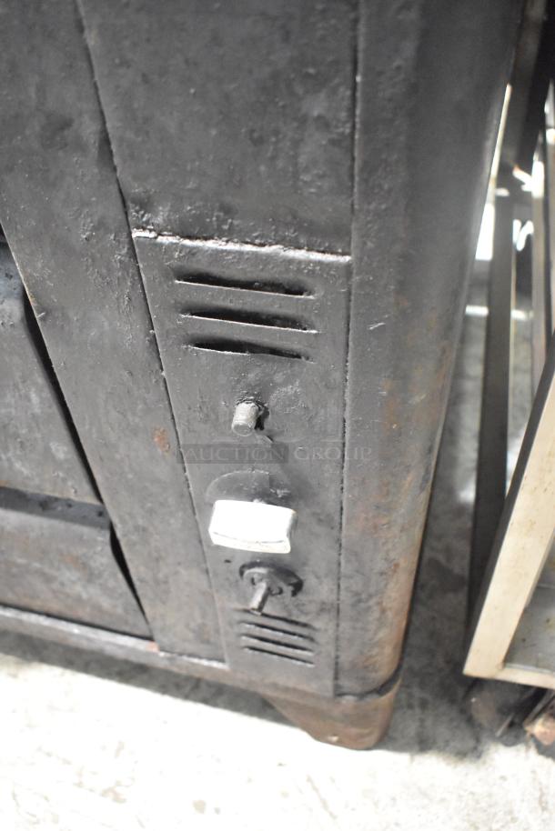 Two Blodgett 981 stainless steel natural gas pizza ovens, dual deck, 50,000 BTU, shown with vented panel and control knob.