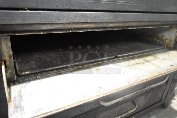 Blodgett 981 stainless steel 2-deck natural gas pizza ovens, 50,000 BTU, used condition, commercial kitchen equipment.