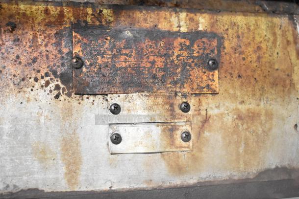 Two Blodgett 981 stainless steel commercial pizza ovens, natural gas powered, 50,000 BTU, with visible metal identification plates.