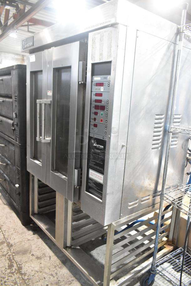 Baxter stainless steel commercial natural gas mini rotating rack oven on double pan rack with casters, digital controls, used.