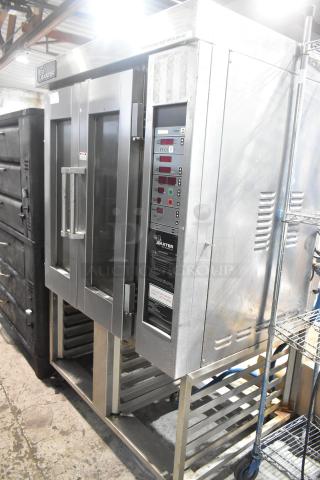 Baxter stainless steel commercial natural gas mini rotating rack oven on double pan rack with casters, digital controls, used.