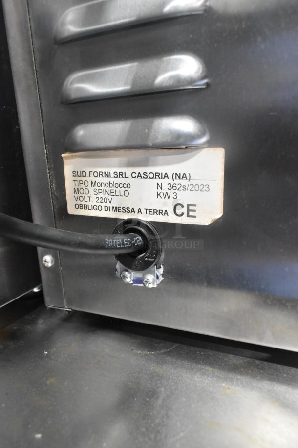 2023 Sud Forni SPINELLO stainless steel pizza oven, single deck, electric, 220V, model and safety labels visible.