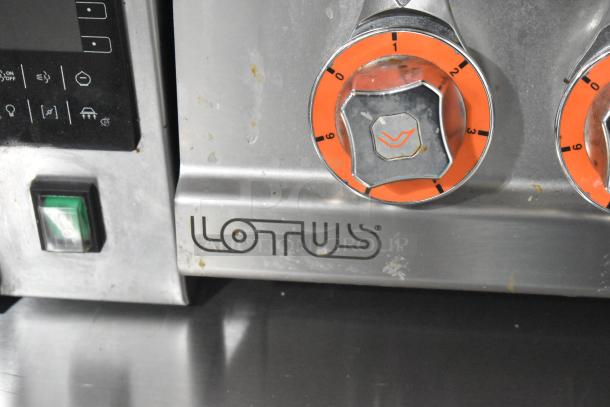2023 Lotus PCT-66ET stainless steel 4-burner electric hot plate range, featuring control knobs and branding.