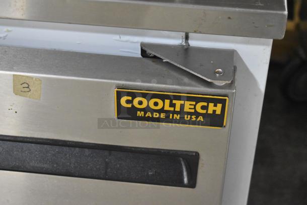 Cooltech CUST-48LB stainless steel chef base with commercial casters, single door, 115V, 1 phase, "Made in USA" label visible.