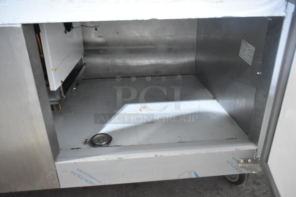 2023 Cooltech CUST-48LB stainless steel chef base, single door, commercial casters, 115V, 1 Phase. Clean interior.