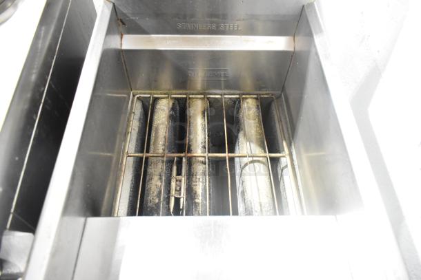 2019 American Range AF-35/50 stainless steel deep fryer, natural gas, 40,000 BTU, two metal fry baskets, commercial casters.