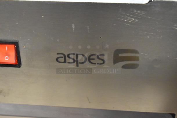 Aspes 2-door stainless steel undercounter cooler with power switch. Visible branding. 120/208V, 1 phase.